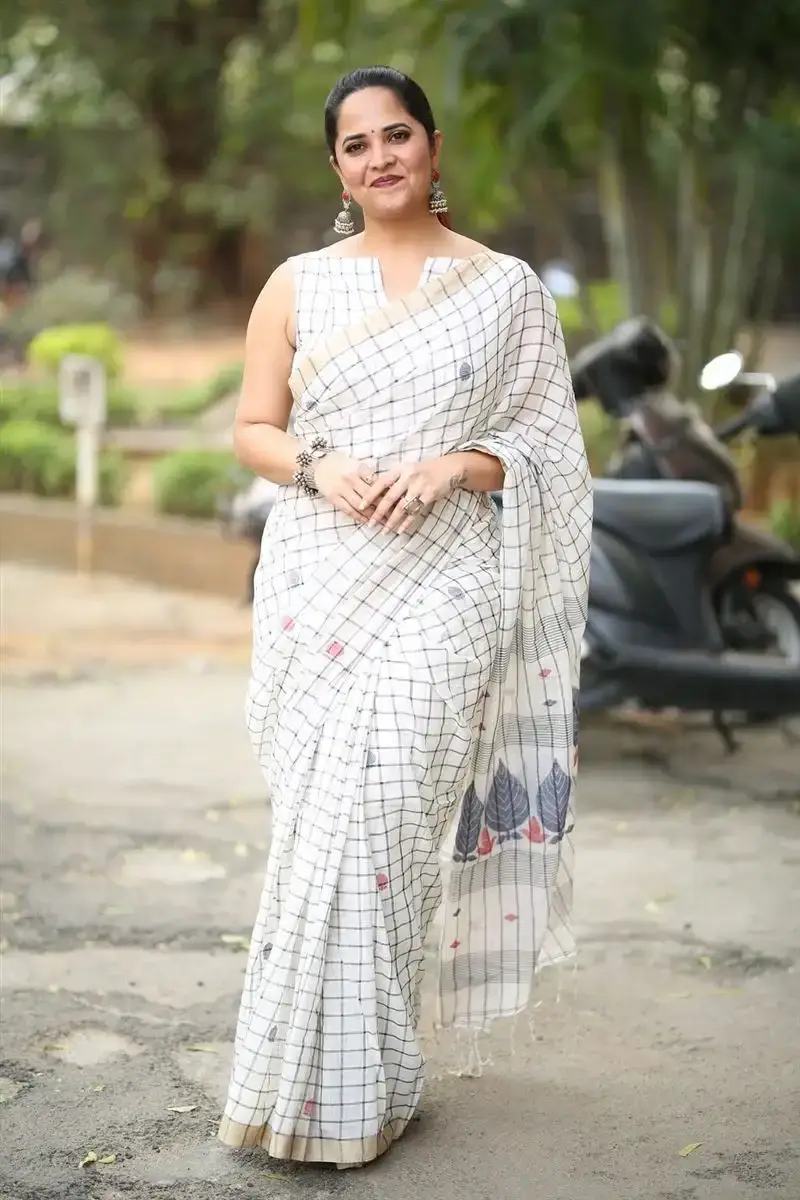 Anasuya Bharadwaj in White Saree at Razakar Movie Launch